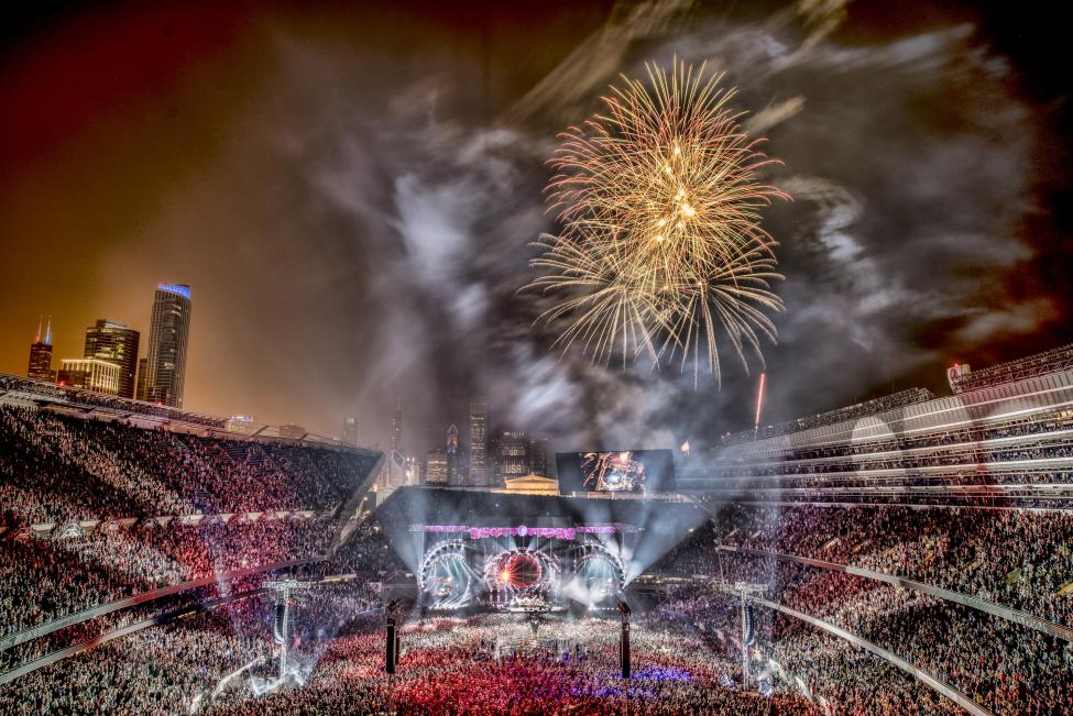 Fireworks explode as veteran rock band The Grateful Dead perform during the second day of their last three concerts at Soldier Field stadium in Chicago