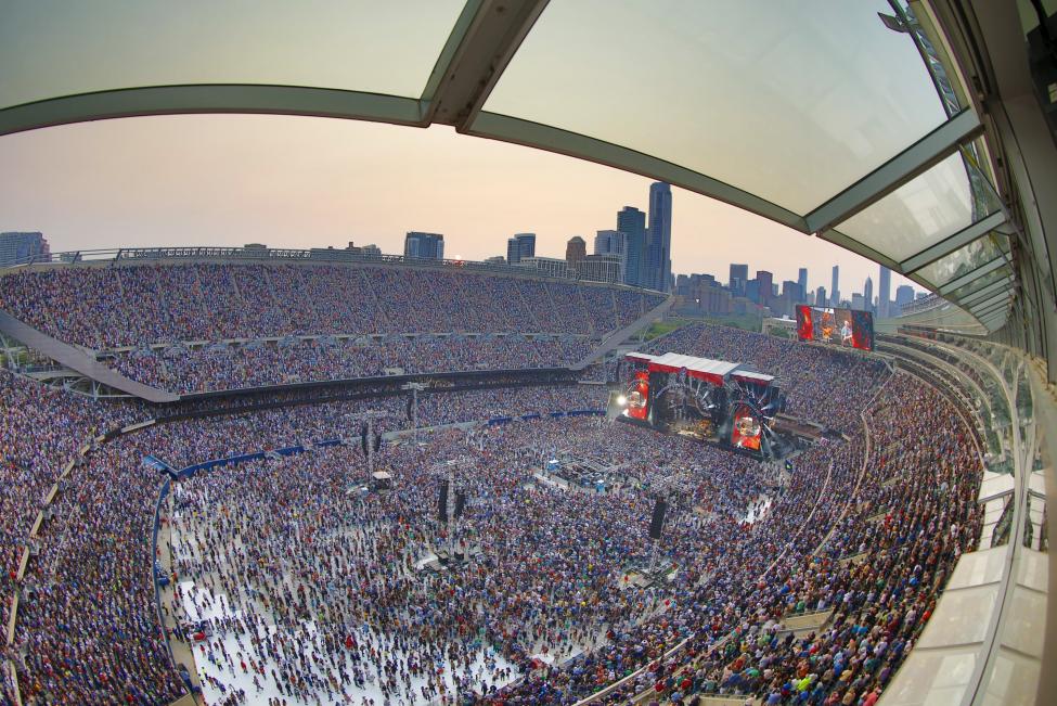 Spectators fill the Soldier Field stadium as rock band The Grateful Dead performs during the first of their last three concerts, in Chicago, Illinois