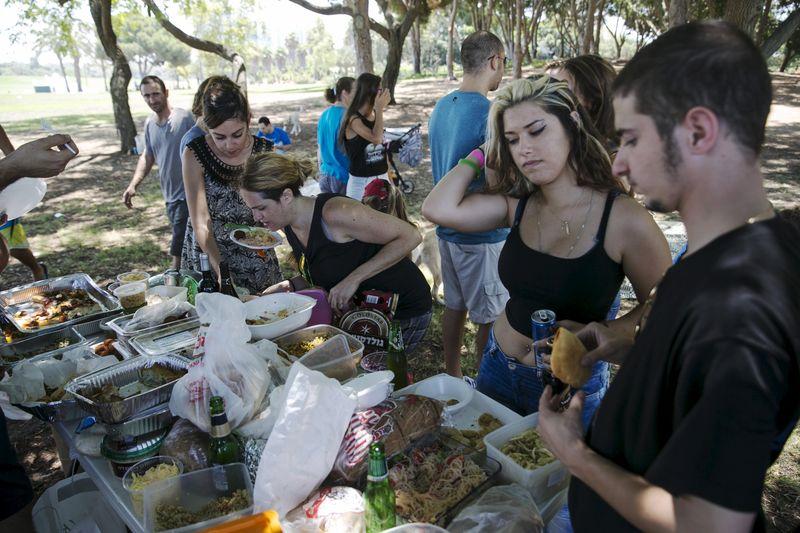 People attend vegan picnic at Hayarkon Park in Tel Aviv