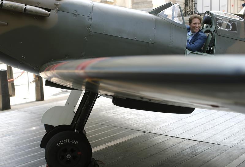American entrepreneur and philanthropist Thomas Kaplan sits in a Mk.1 Spitfire on display outside the Churchill War Rooms in London