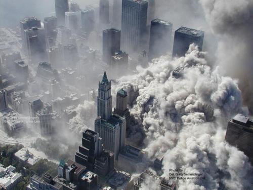 ** ADDS INFORMATION REGARDING SOURCING OF IMAGE ** This photo taken Sept. 11, 2001 by the New York City Police Department and obtained by ABC News, which claims to have obtained it under the Freedom of Information Act, shows smoke and ash engulfing the area around the World Trade Center in New York. (AP Photo/ NYPD via ABC News, Det. Greg Semendinger) MANDATORY CREDIT